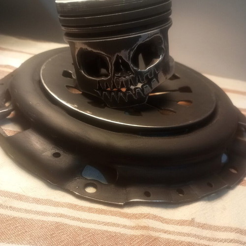 Handmade desk lamp with piston and clutch plate in deep black mat