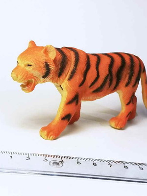 Animal plastic figure used with scratches and marks
