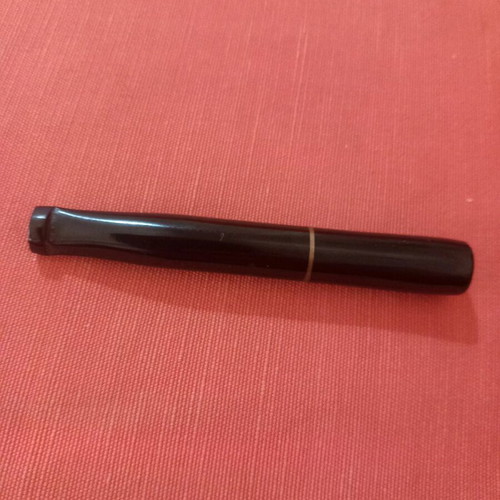 Cigarette holder used for regular cigarettes, not slim