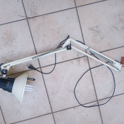 Office lamp with articulated spring and spiral clock