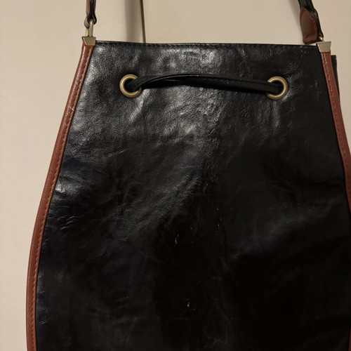 Bartuggi vintage leather shoulder bag black with brown details and gold buckle like new