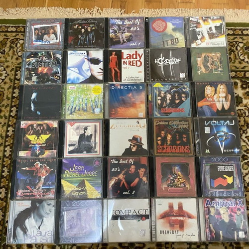 Various used pop CDs