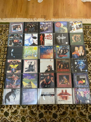 Various used pop CDs