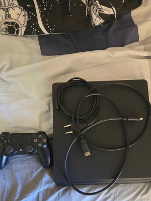 PlayStation 4 slim 1TB like new with slightly broken controller