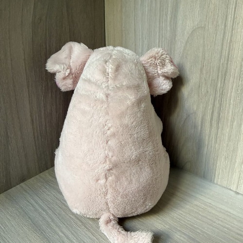 Small pink plush pig toy