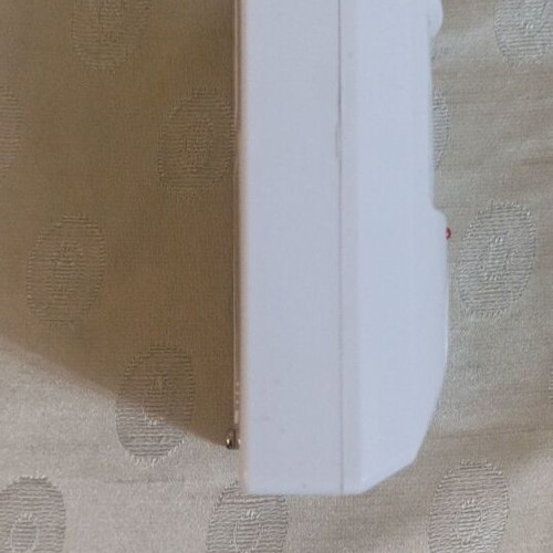 Mini Alarm like new with two remote controls and mounting bracket