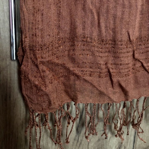 Scarf used, brown color