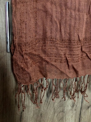 Scarf used, brown color