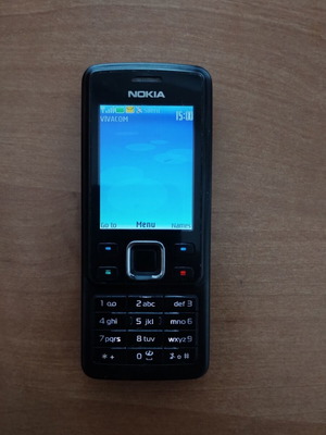 Nokia 6300 phone like new, black, memory card