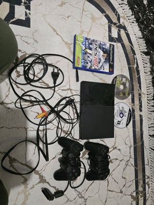 PlayStation 2 Slim μεταχειρισμένο για συλλογή ή επισκευή με παιχνίδια και 2 χειριστήρια