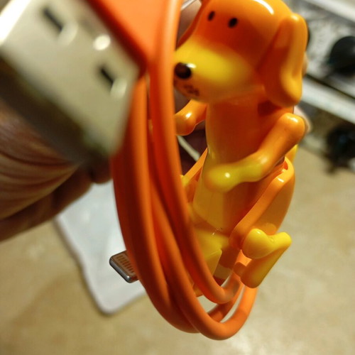 iPhone charger new with moving dog figure