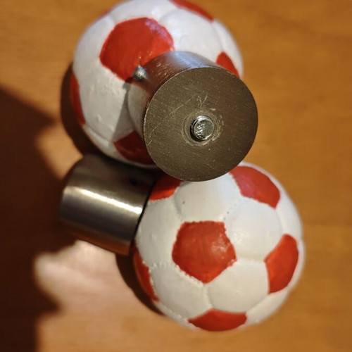 Football curtain rod finials, pair, red and white