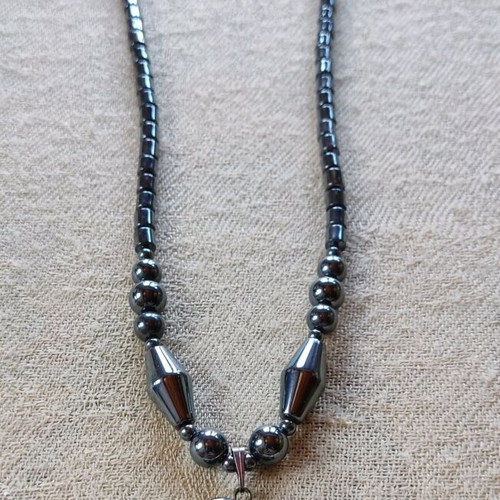 Hematite necklace like new with dolphin pendant
