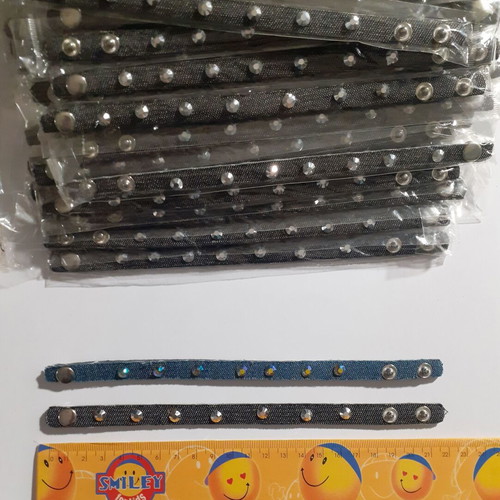 Pack of 235 denim and faux leather bracelets with rhinestones
