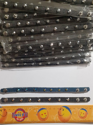 Pack of 235 denim and faux leather bracelets with rhinestones