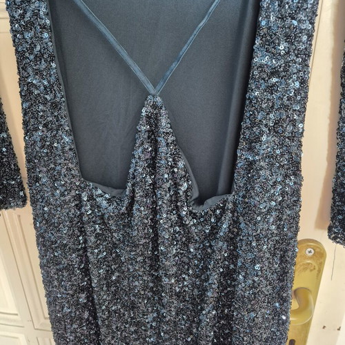 Official dresses in blue-green and black-gold XL, others S