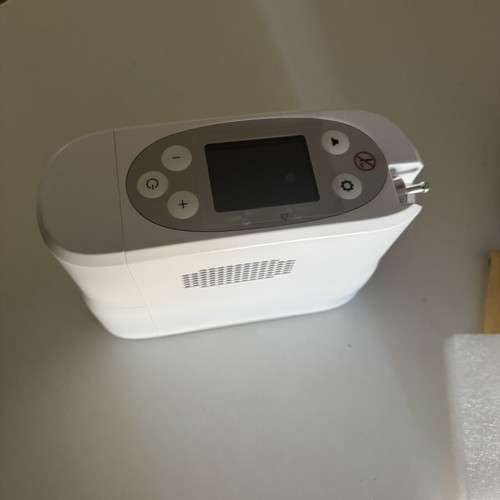 Portable Oxygen Device new with charger and car adapter