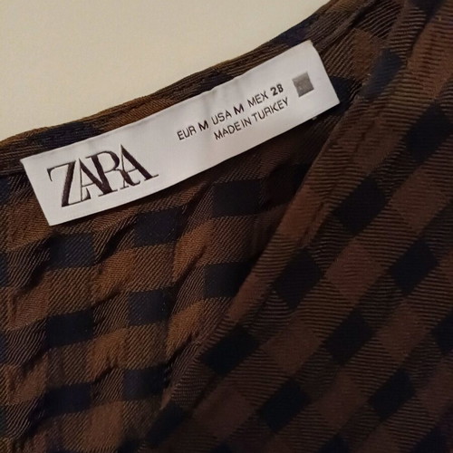 Zara dress like new with checkered pattern and pleats