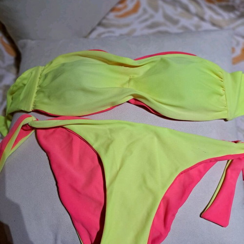 Bikini reversible like new with detachable cord, pink and yellow