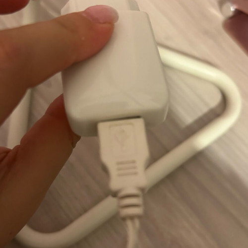 Minimalist white lamp with USB port used