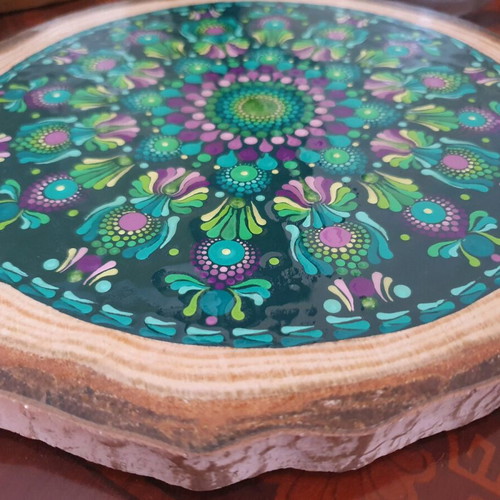 Handpainted wooden decorative plate with mandala design