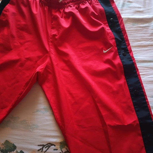 Nike sports pants with side buttons like new, black and red, size L
