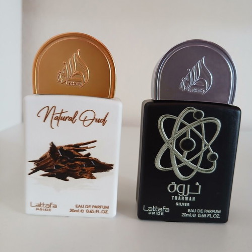 Lattafa Natural Oud and Tharwan Silver perfume set like new