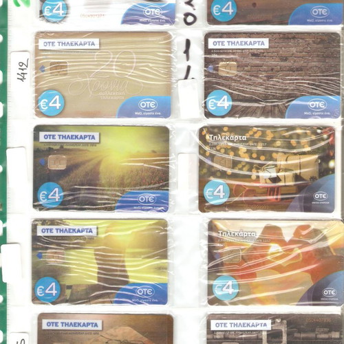 Collection of used 2307 phone cards with holders