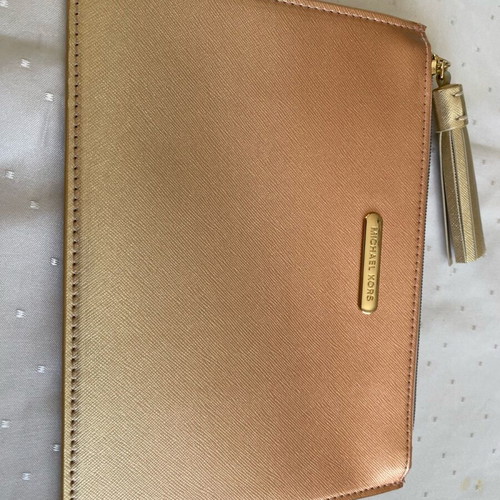 Michael Kors rare collectible clutch new, gold ombre with tassel