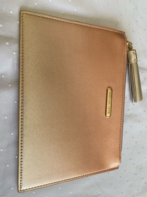 Michael Kors rare collectible clutch new, gold ombre with tassel