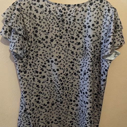 Women's blouse medium/large, beige with black floral pattern