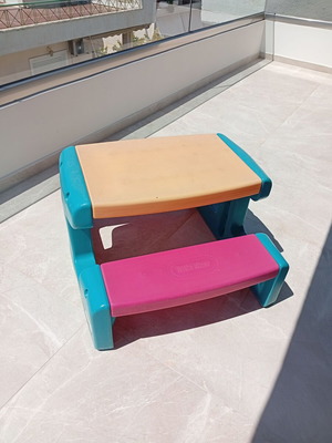 Little Tikes plastic picnic table used for kids