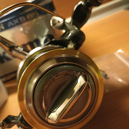 Okuma Axeon AXS 65 fishing reel like new with extra spool