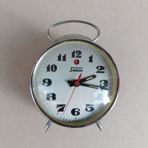 Metal wind-up vintage alarm clock