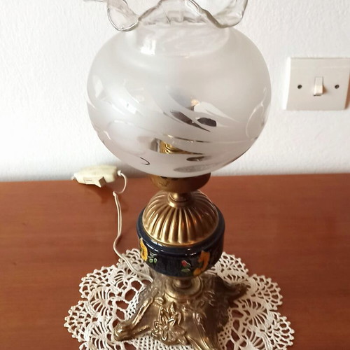 Vintage table lamp with glass shade and decorative metal base used