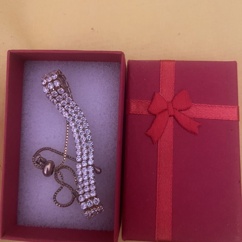 Silver anklet and gold bracelet with rhinestones like new
