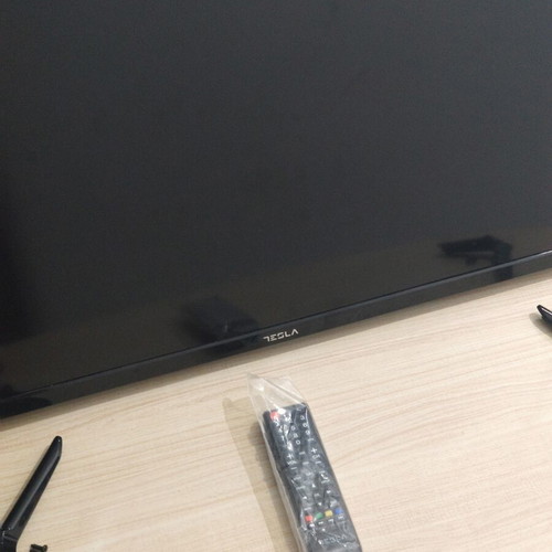 Tesla 32-inch TV with stand like new