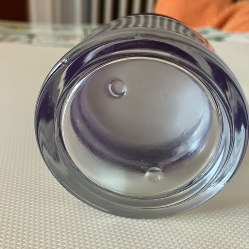 Empty 50 ml container made of thick glass, like new