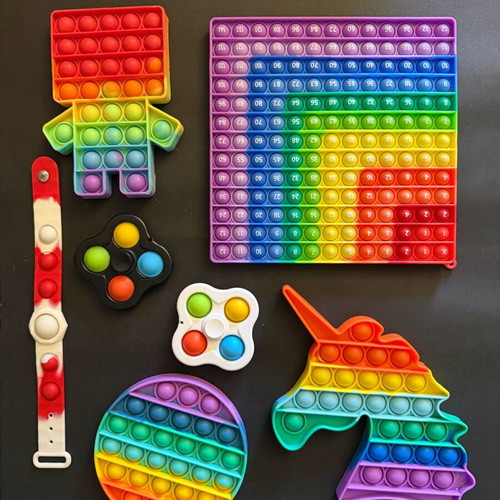 Set of 7 Pop It toys like new, includes multiplication learning