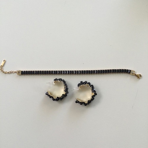 Bracelet and earrings set made of steel and crystals like new