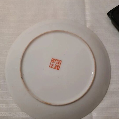 Vintage decorative porcelain plate with Japanese geisha design used