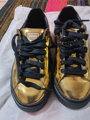Puma women's athletic shoes 37.5 gold like new