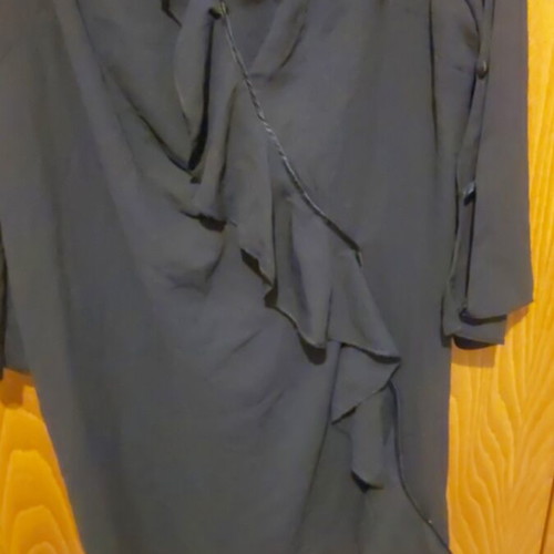 Dress with ruffles and sleeve openings like new, black