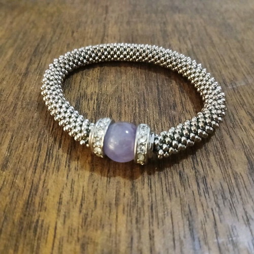 Women's bracelet with purple stone and white gems like new