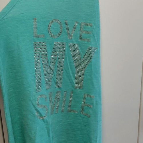 Women's tshirt one size used, turquoise with gold details