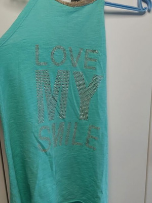 Women's tshirt one size used, turquoise with gold details