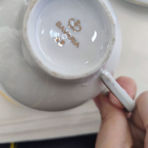 Porcelain tea cup set used, two cups with saucers