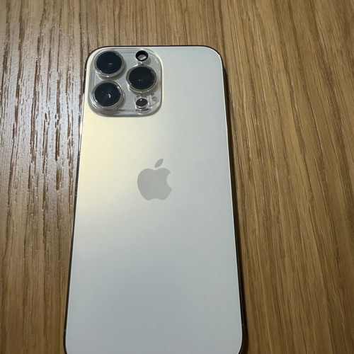 iPhone 14 Pro Max gold, like new, 128GB with charger and cases