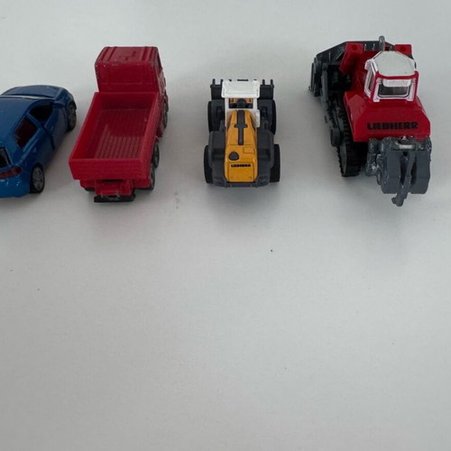 Siku 1:87 4 pieces like new, Scania truck, Liebherr 764, VW Golf