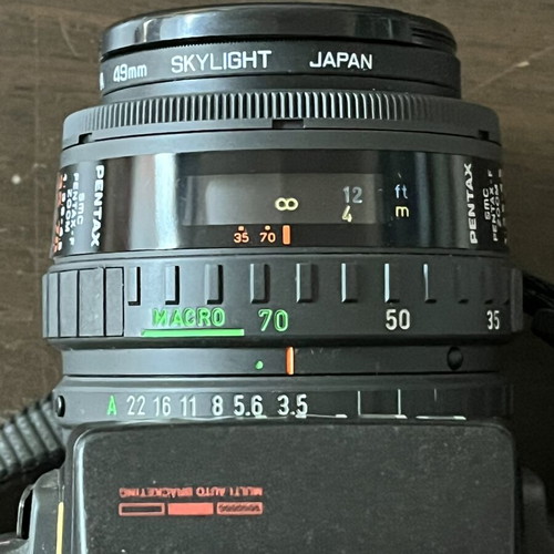 Pentax SFXn 35mm Analog Camera with SMC Pentax-F Zoom Lens like new